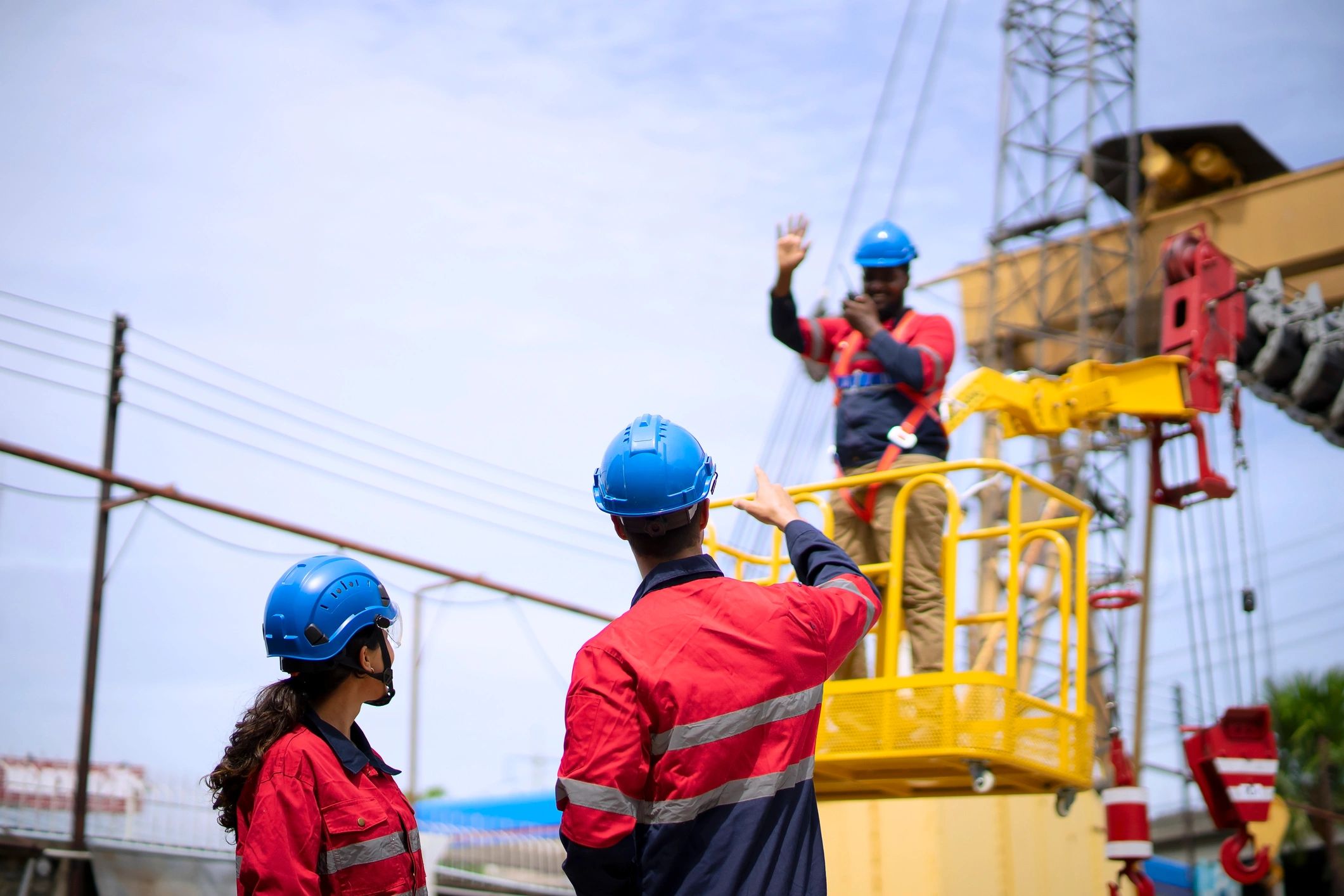 Engineers coordinating work at an industrial construction site