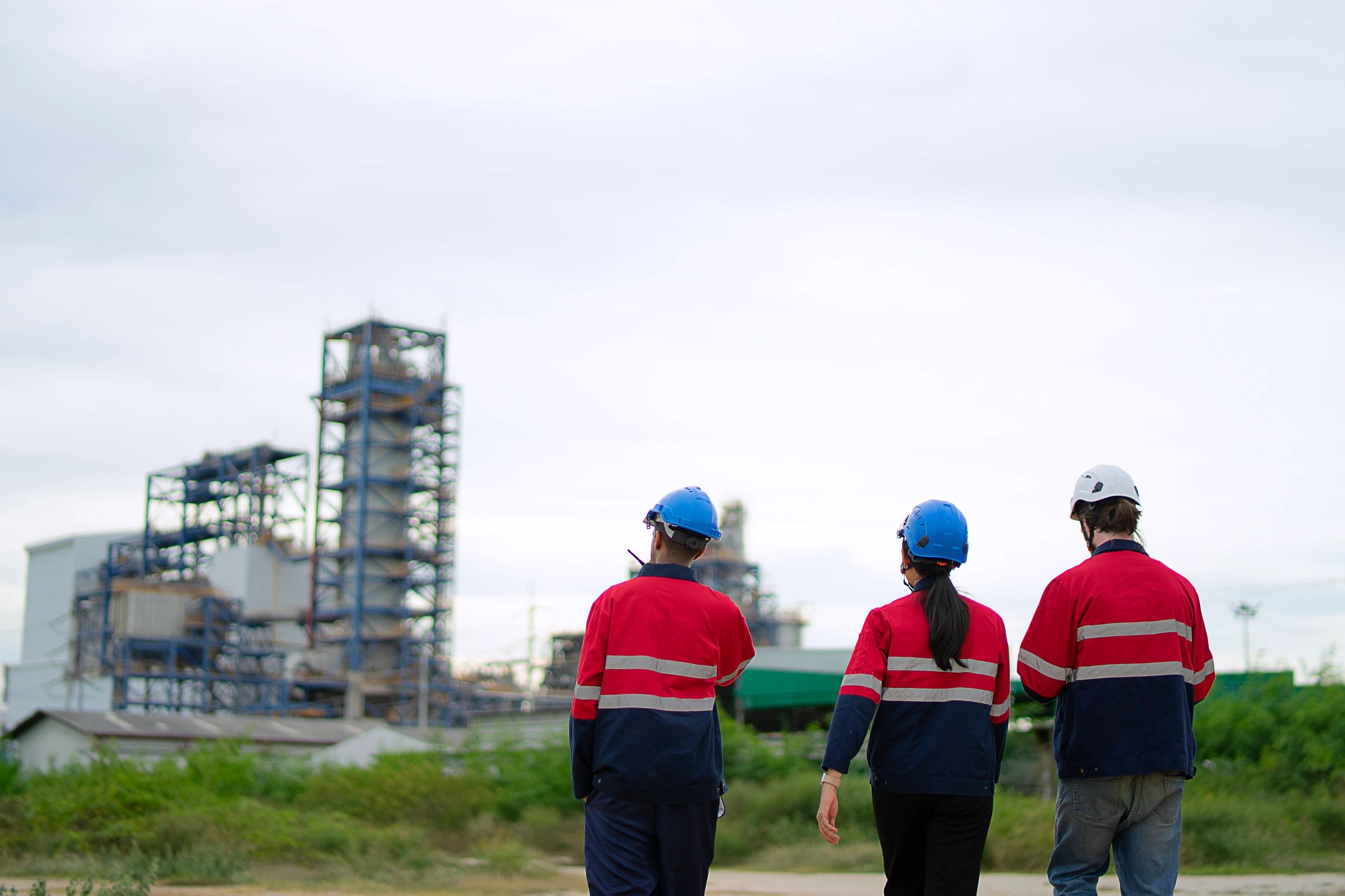 Blue collar workers at a large industrial facility
